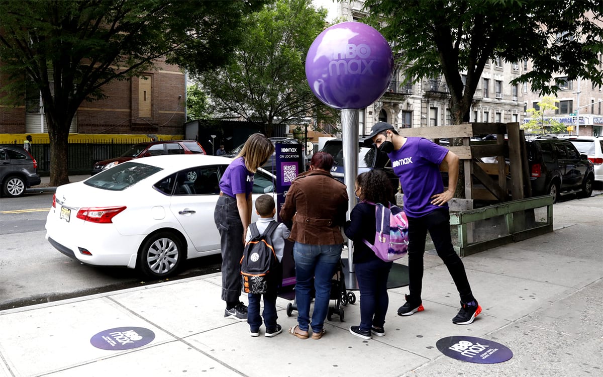 hbo-max-on-location-family gathers around oversized purple pin