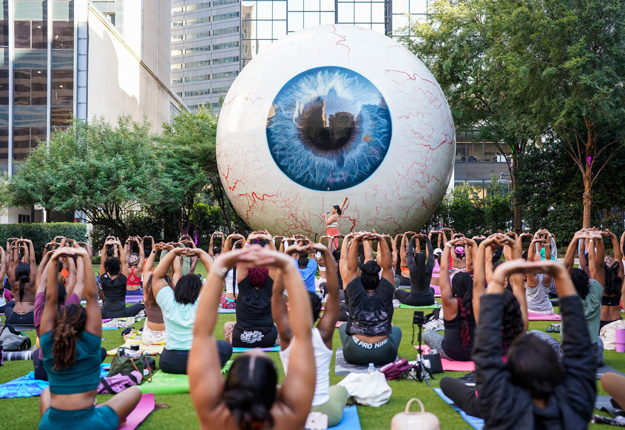 black-magic-reimagined-2023-yoga-in-front-of-eyeball-installation