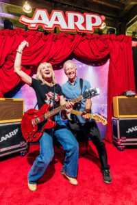 aarp's rolling stones tour sponsorship guitar photo op