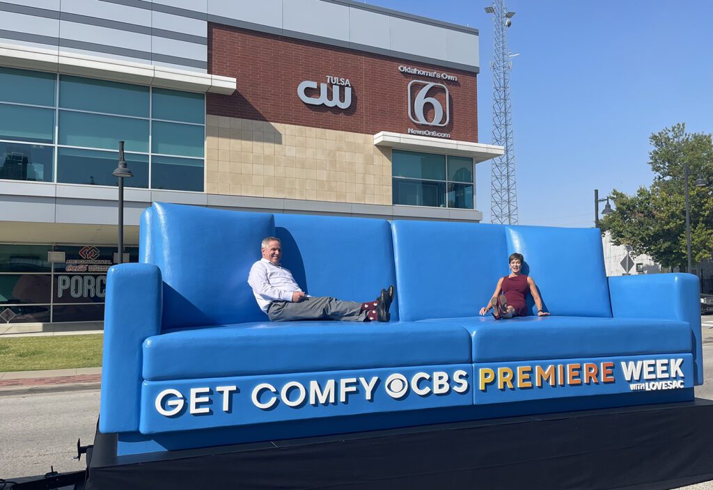 CBS_ Comfy Blue Sofa Tour_2024_broadcasters on sofa